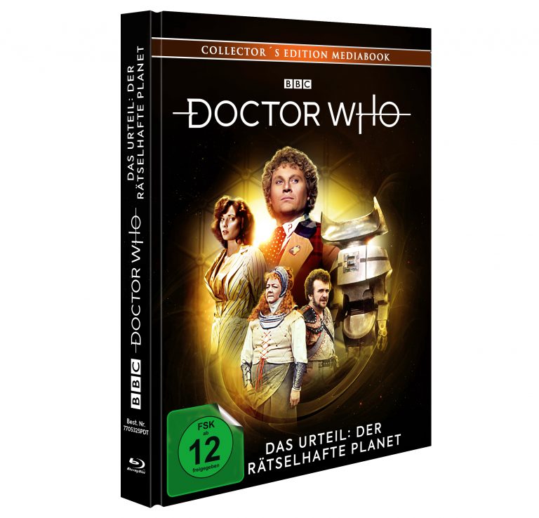 Doctor Who – Das Urteil: Der rätselhafte Planet (Collector's Edition Mediabook). Das Cover zeigt den sechsten Doctor (Colin Baker) in seiner bunten Jacke, umgeben von Charakteren und Robotern aus der Episode, vor einem goldenen, futuristischen Hintergrund. Veröffentlicht von der BBC, inklusive Blu-ray, FSK 12 freigegeben.